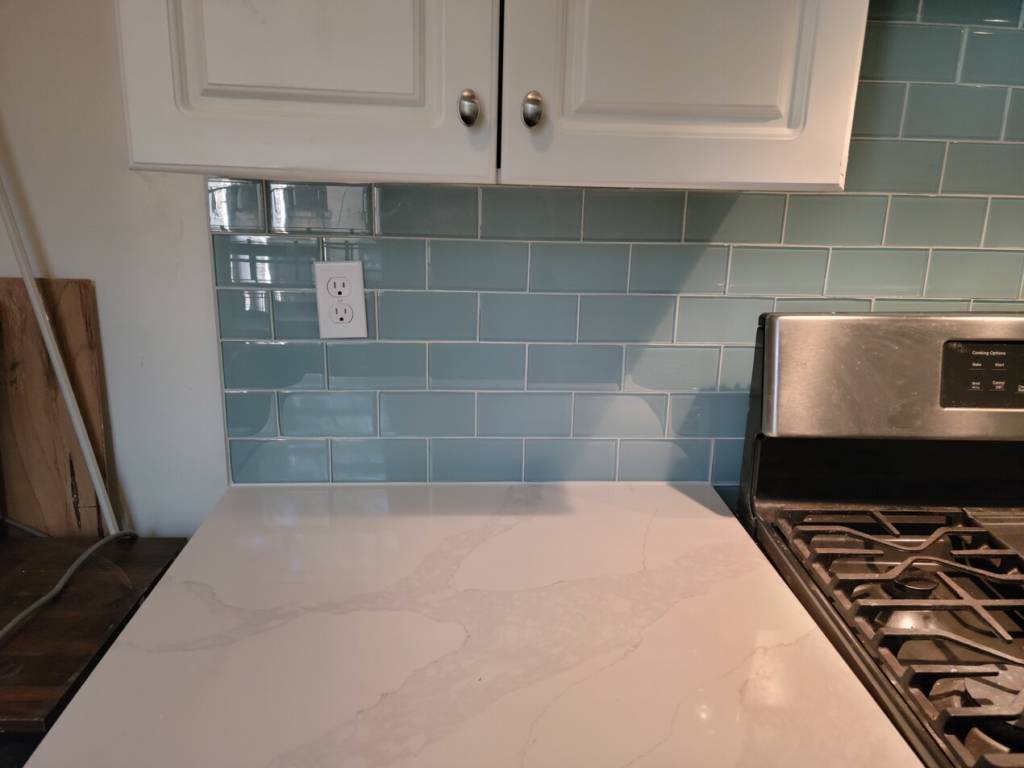 kitchen tile wall repaired and new tile installation complete