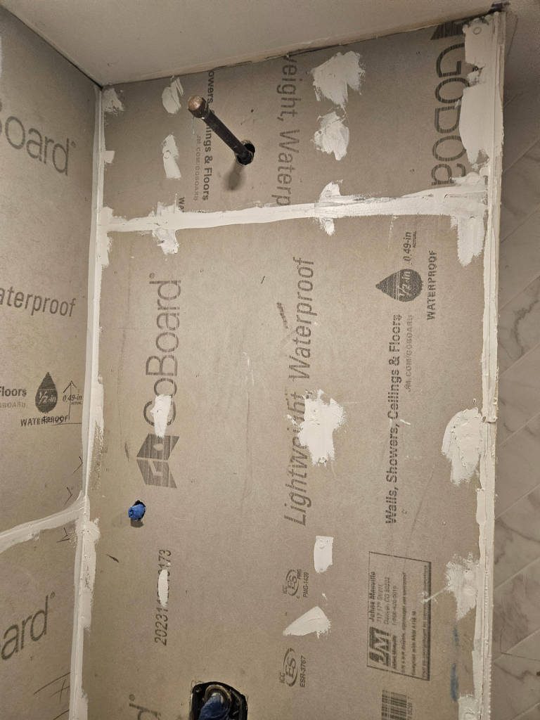 bathroom prepared for full tile installation