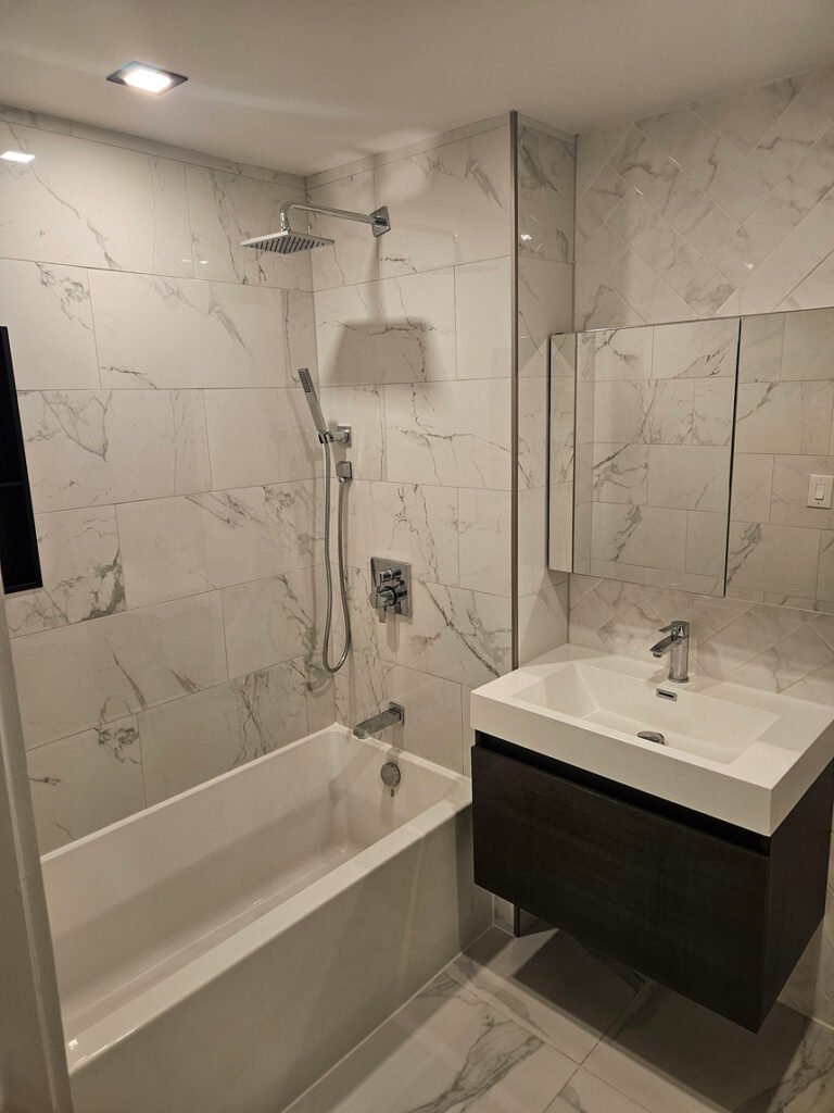 image of bathroom tile installation in Manhattan New York by Grout Pros NYC